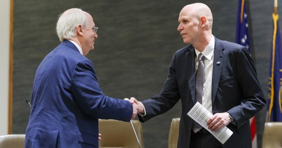 University of Nebraska System President Dr. Jeffrey Gold, left, introduces UNK chancellor priority candidate Neal Schnoor during Wednesday’s press conference at Varner Hall in Lincoln. (Photo by Erika Pritchard, UNK Communications)